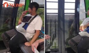 teen_vaping_smoking_inside_cablecar_singapore